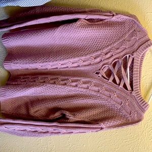 Lavender knit sweater with detailed neckline